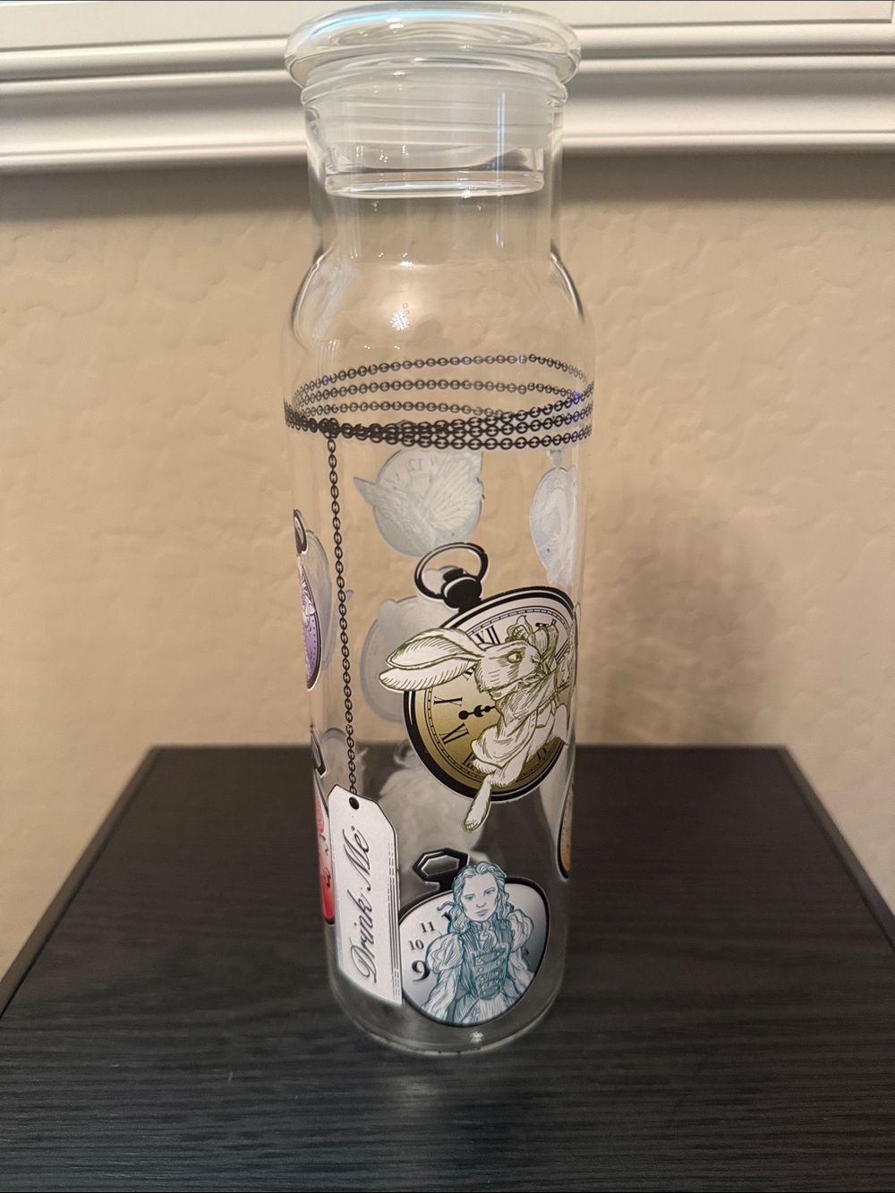 NWOT Decorative Disney Glass Drinking Bottle with Lid - Alice In Wonderland